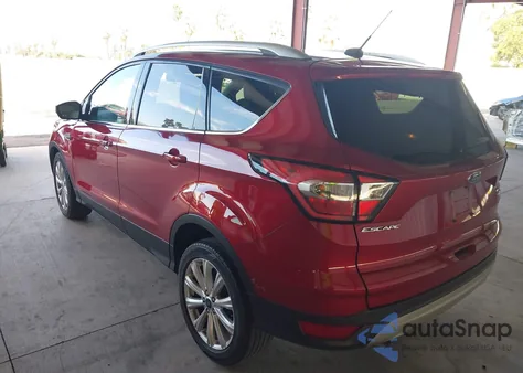 2017 Ford Escape Titanium z USA, uszkodzony, nr VIN 1FMCU0J98HUD29348
